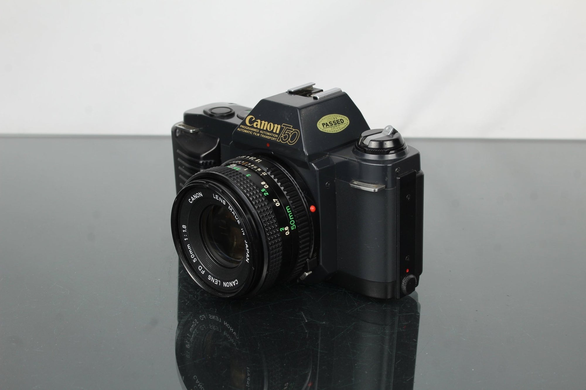 Canon T50 + 50mm 1.8 Canon FD lens - Dutch|Thrift