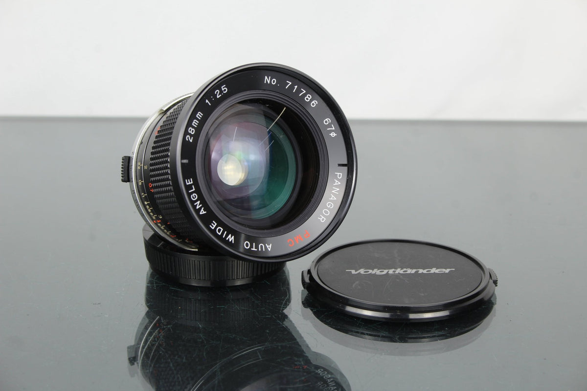 Panagor 28mm 1:2.5 OM mount - Dutch|Thrift